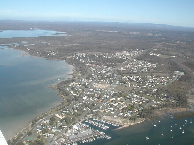 TIN CAN BAY Real Estate Agents Raine & Horne